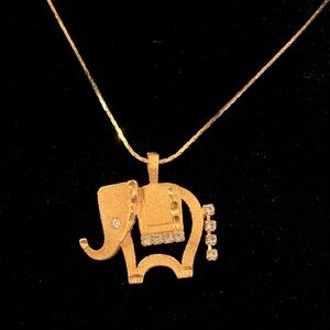 Goldtone Elephant Pendant on Necklace With Rhinestone accents 24 inches